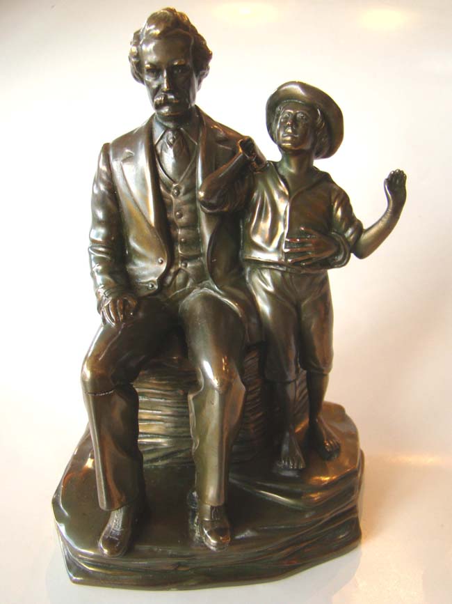An extremely rare pair of vintage Mark Twain and Tom Sawyer bookends by Jennings Brothers circa 1936 — image 2